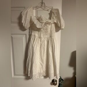adorable off the shoulder baby doll boutique dress- white with subtle polkadots